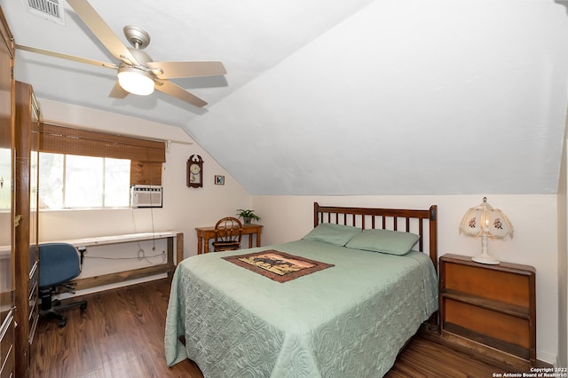 bedroom featuring ceiling fan, cooling unit, dark hardwood / wood-style floors, and vaulted ceiling