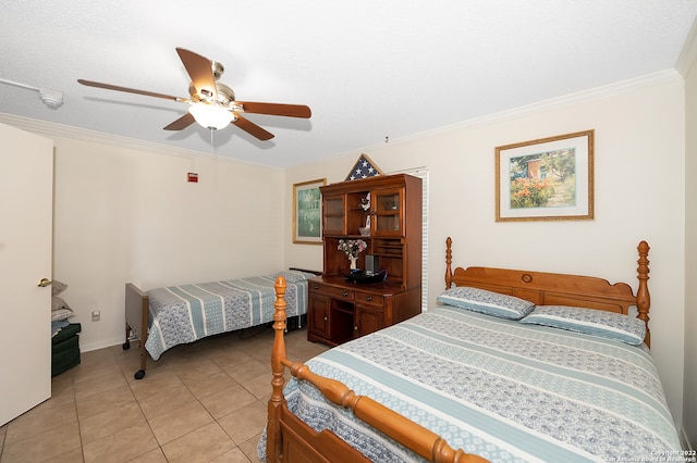 tiled bedroom with ceiling fan and ornamental molding