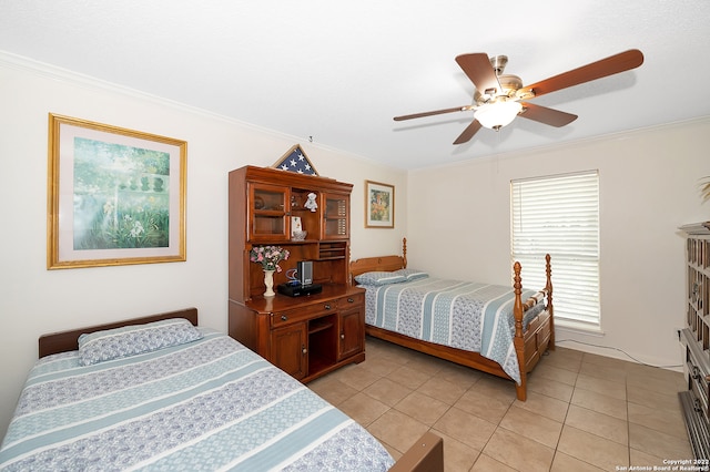 tiled bedroom featuring ceiling fan and crown molding