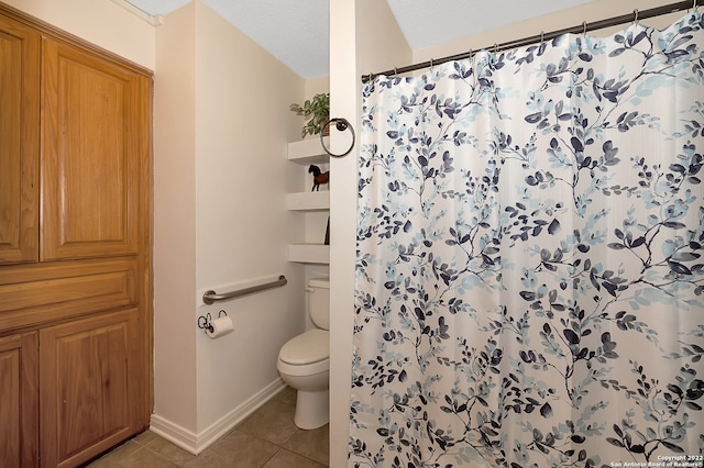 bathroom with tile patterned flooring, curtained shower, a textured ceiling, and toilet