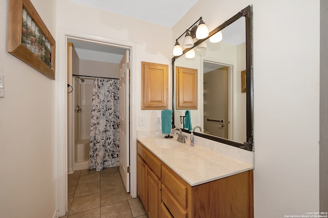 bathroom with vanity, tile patterned flooring, and shower / tub combo with curtain