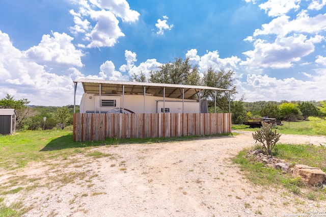 exterior space with an outbuilding