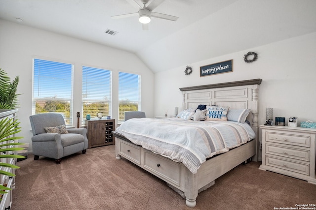 carpeted bedroom featuring ceiling fan and vaulted ceiling