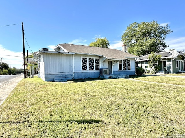 1244 Rigsby Ave, San Antonio, TX 78210 - ranch-style home with a chimney and a front yard