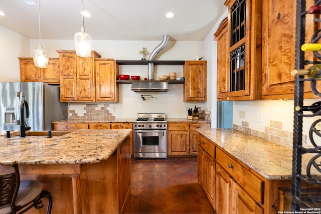 kitchen with pendant lighting, a breakfast bar, light stone counters, appliances with stainless steel finishes, and a center island