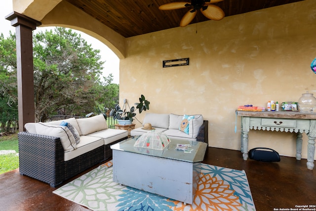 view of patio featuring exterior kitchen, an outdoor hangout area, and ceiling fan