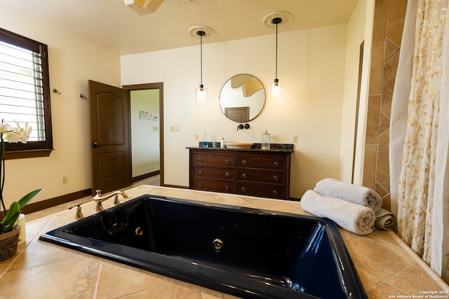 bathroom featuring a bathtub and vanity