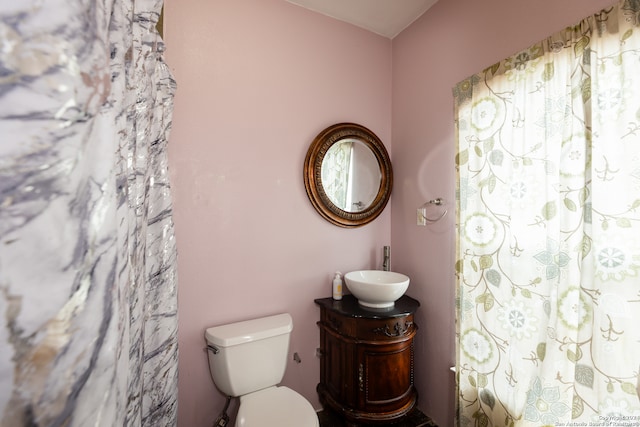 bathroom with vanity and toilet