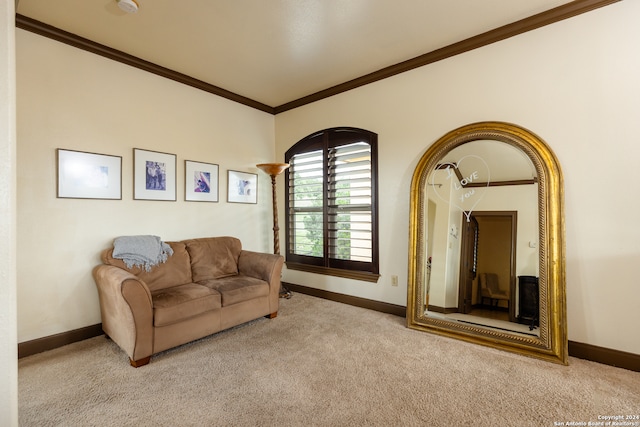 carpeted living room featuring ornamental molding