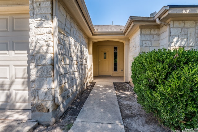 property entrance featuring a garage