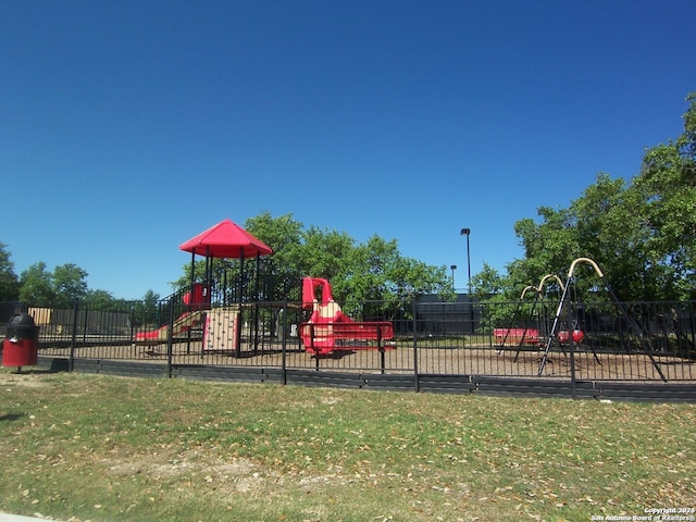 view of jungle gym with a yard