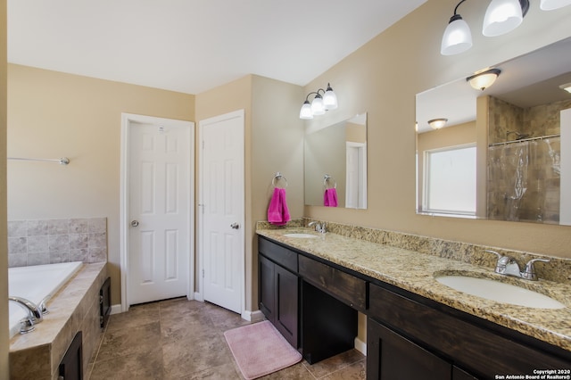 bathroom featuring vanity, shower with separate bathtub, and tile patterned floors