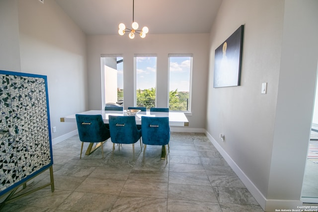 dining room featuring a notable chandelier