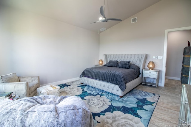 bedroom featuring wood finished floors, visible vents, baseboards, and ceiling fan