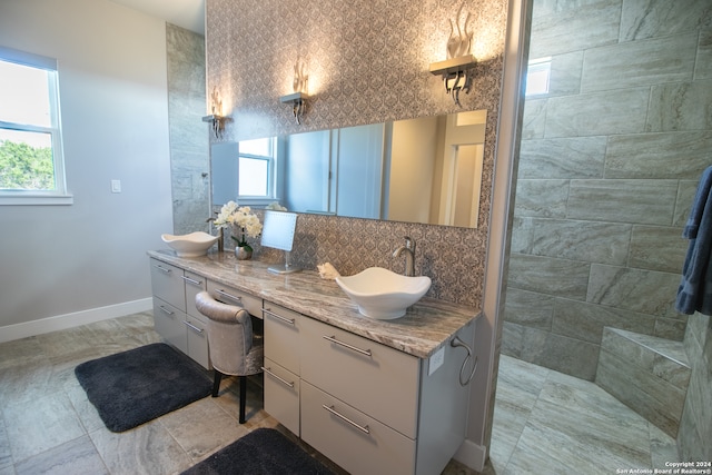 bathroom featuring vanity and a healthy amount of sunlight