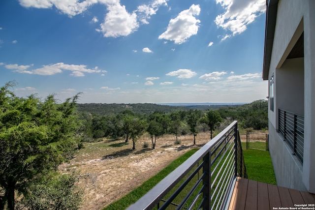 balcony with a wooded view