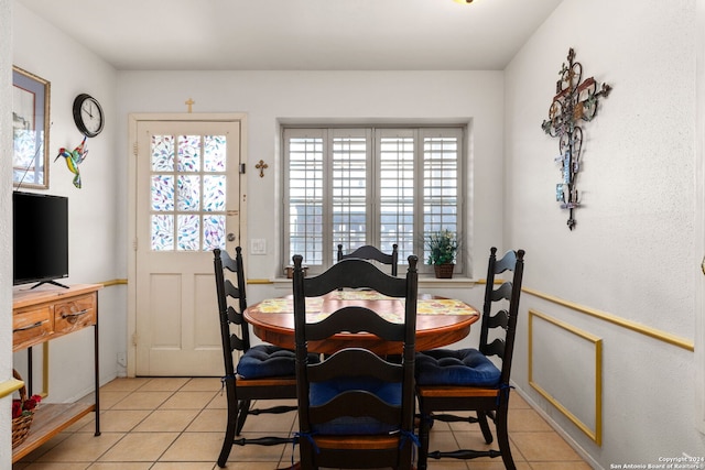 dining room featuring light tile patterned flooring