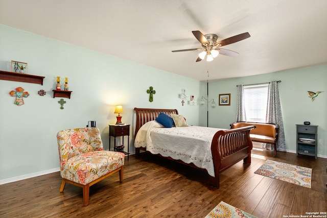 bedroom featuring dark wood-type flooring and ceiling fan