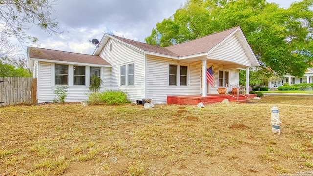 1801 3rd St, Floresville, TX 78114 - view of front of house with a porch and roof with shingles