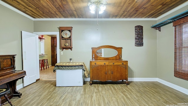 1801 3rd St, Floresville, TX 78114 - misc room with a ceiling fan, wood finished floors, crown molding, baseboards, and wooden ceiling