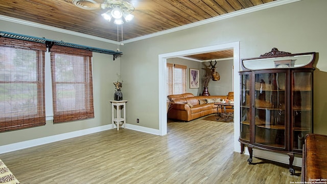 1801 3rd St, Floresville, TX 78114 - sitting room featuring a ceiling fan, ornamental molding, wood finished floors, wood ceiling, and baseboards