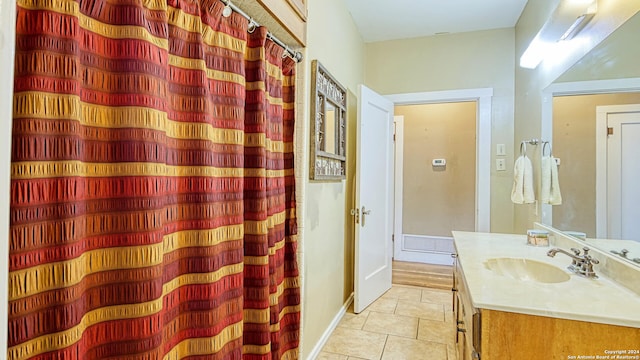 1801 3rd St, Floresville, TX 78114 - bathroom featuring vanity, tile patterned floors, and a shower with shower curtain
