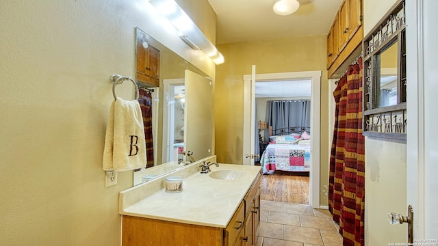 bathroom with vanity and tile patterned floors