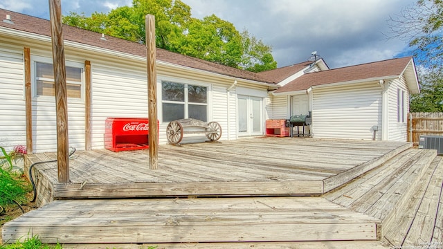 1801 3rd St, Floresville, TX 78114 - deck featuring central air condition unit and a grill