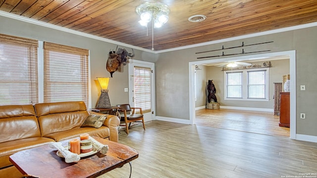 living area with crown molding, ceiling fan, light wood-style flooring, baseboards, and wooden ceiling