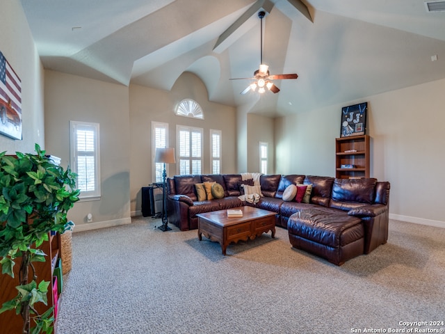 living room with beam ceiling, high vaulted ceiling, light colored carpet, and ceiling fan