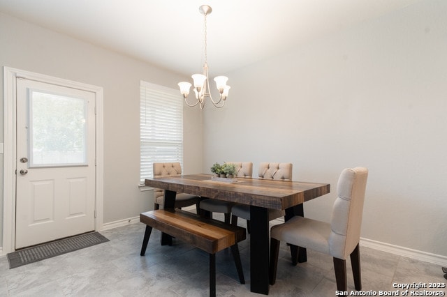 dining room with a chandelier