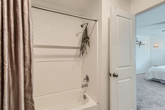 bathroom featuring shower / bathtub combination with curtain