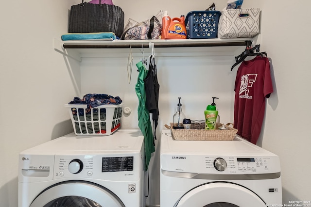 washroom with washing machine and dryer