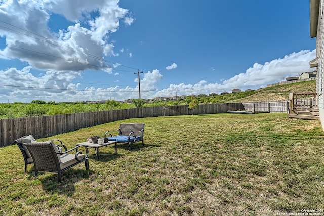 view of yard featuring a wooden deck