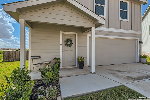 property entrance featuring a garage