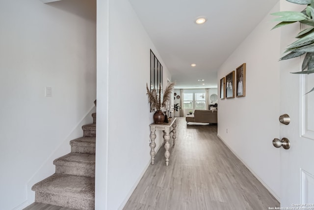 corridor featuring hardwood / wood-style flooring