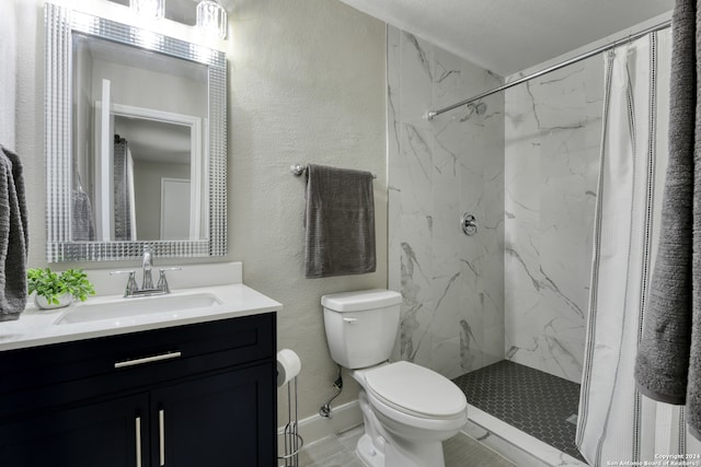 bathroom with vanity, toilet, and a shower with shower curtain