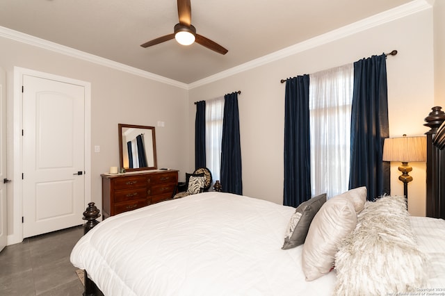 bedroom with ornamental molding and ceiling fan