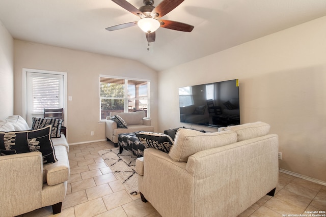 tiled living room with vaulted ceiling and ceiling fan