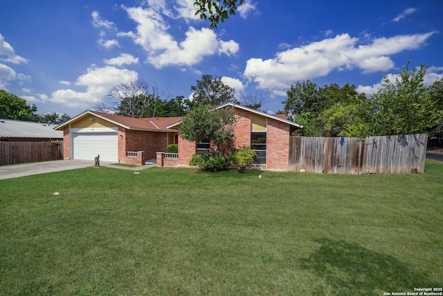 8315 Greenham, San Antonio, TX 78239 - view of front of house with brick siding, concrete driveway, and an attached garage