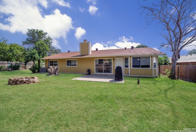 8315 Greenham, San Antonio, TX 78239 - rear view of property with a chimney and a patio