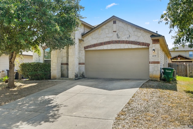 view of front of property with a garage