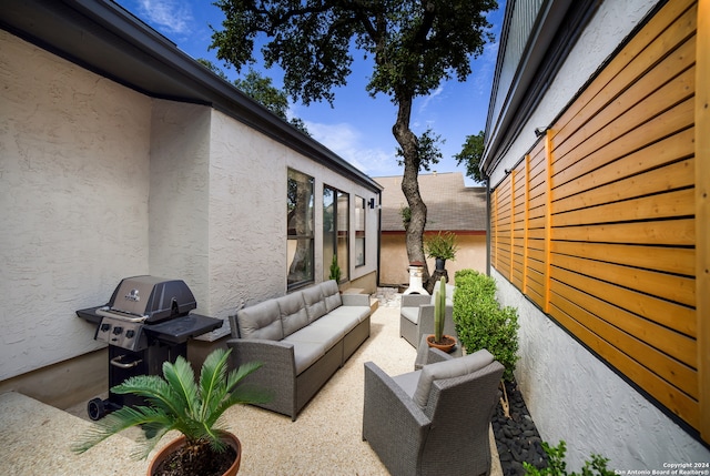 view of patio / terrace with grilling area and an outdoor living space