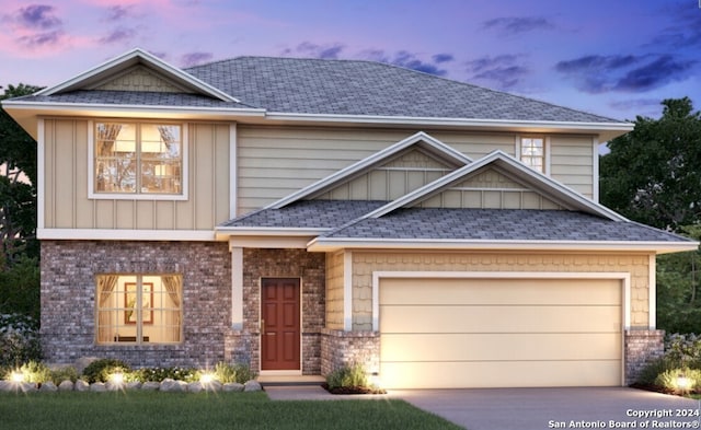 craftsman house with a garage