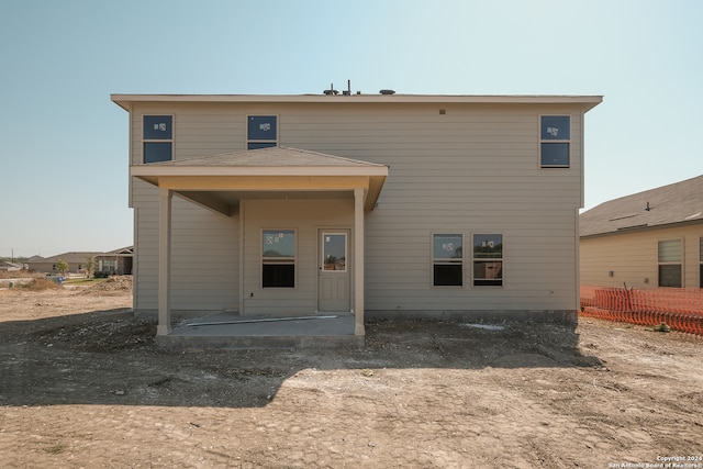 back of house featuring a patio area