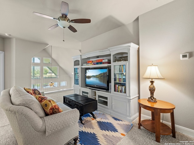 carpeted living room featuring ceiling fan