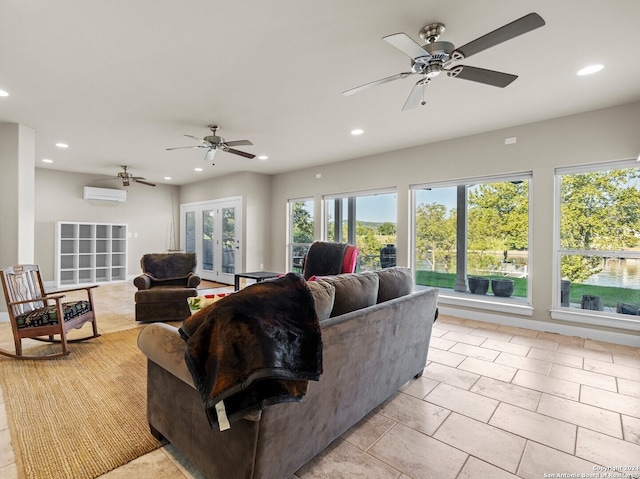 living room featuring french doors, an AC wall unit, and ceiling fan