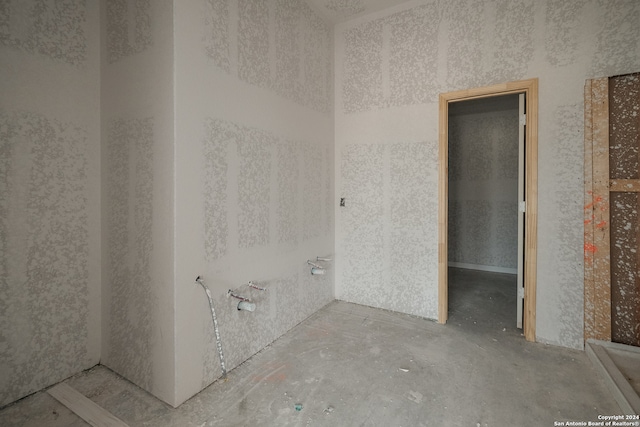 bathroom with concrete floors