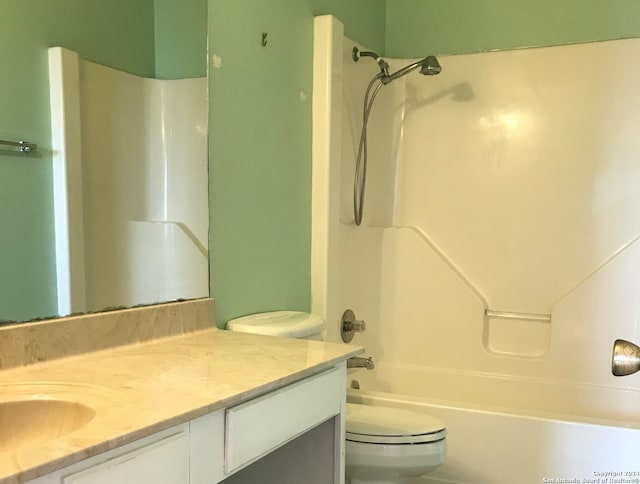 full bathroom featuring vanity, shower / bathtub combination, and toilet