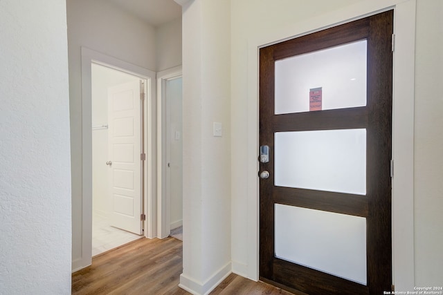 interior space with hardwood / wood-style floors